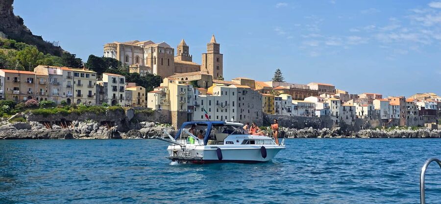 Cefalù: Coast-to-coast boat day trip with snorkeling and aperitif - Mazzaforno Beach: your first swim