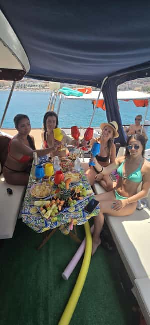 Cefalù: Coast-to-coast boat day trip with snorkeling and aperitif - The guide, the crew, and the service question