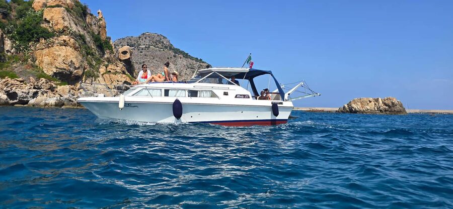 Cefalù: Coast-to-coast boat day trip with snorkeling and aperitif - Meeting the boat at Cefalù harbor