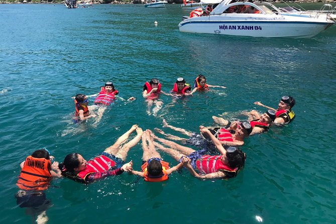 Cham Island Snorkeling Daily Group Tour, Sunbathing, nice beaches - Arriving on Cham Island by speedboat