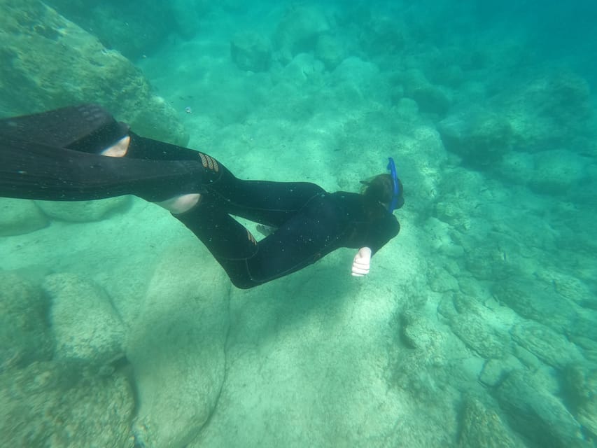 Chania: Boat Trip with Guided Snorkeling Tour - First snorkeling stop: a guided start in clear water