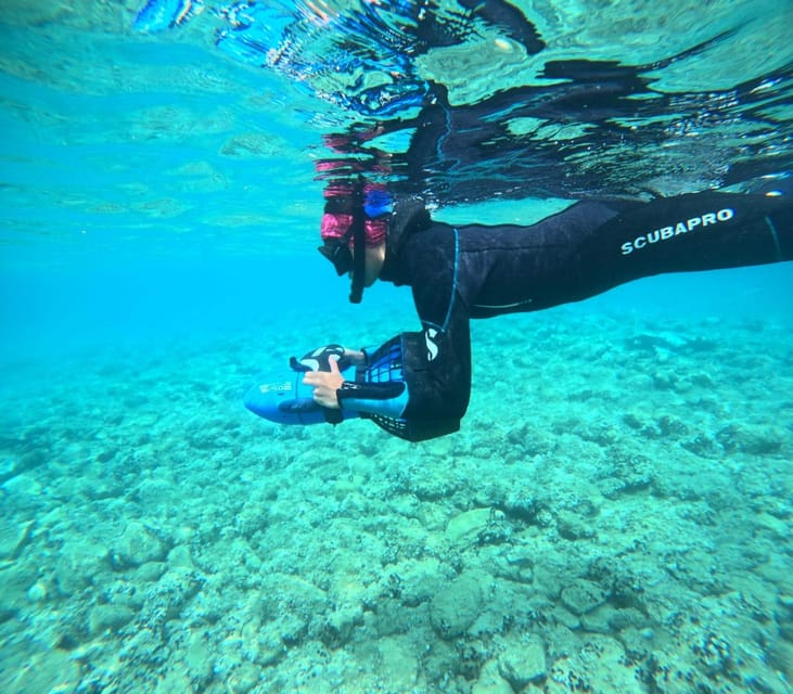 Chania: Sea Scooter Snorkeling boat tour - Guides, boat atmosphere, and group dynamics
