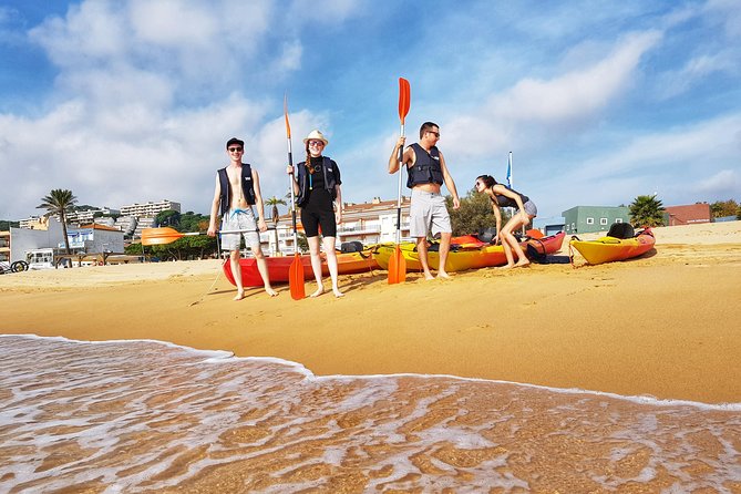 Costa Brava Tour with Kayak & Lagoon Snorkeling - Kayaking past cliffs and sea caves