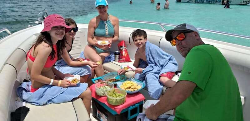 Cozumel: Private Charter Boat and Snorkel Day Trip - The first stop: guided snorkeling at a secluded reef