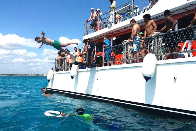 Dancer Cruise Isla Mujeres Snorkel Food and Drinks Included - Slide, Springboard, and Swimming Stop