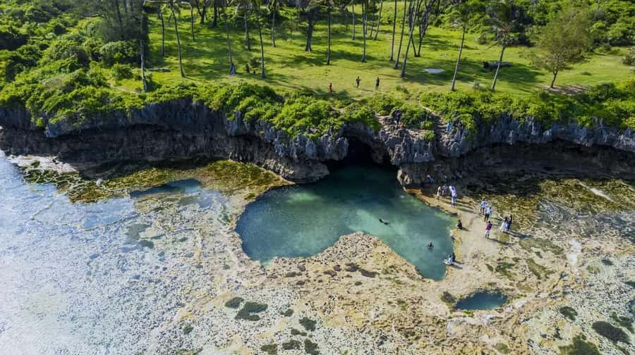 Diani: Snorkeling and Swimming at African Pool in Tiwi Beach - Choosing between a motorbike and the reef route