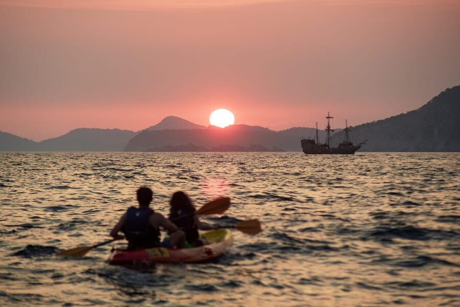 Dubrovnik: Sunset Kayaking and Snorkeling Tour - The city walls from the sea