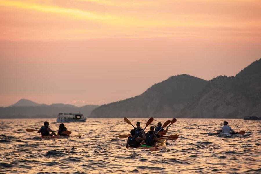Dubrovnik: Sunset Kayaking and Snorkeling Tour - Paddling past the Old Port