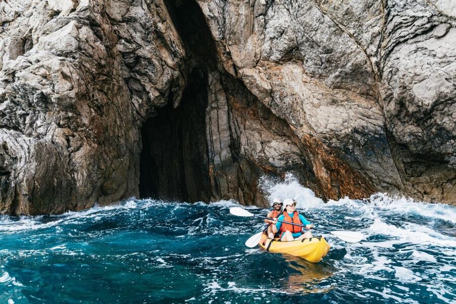 Es Figueral: Guided Kayaking and Snorkeling Tour - Ses Mayoles and the fun of paddling near the rocks
