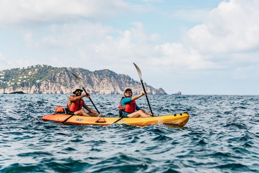 Es Figueral: Guided Kayaking and Snorkeling Tour - The first 30 minutes along Es Figueral’s rocky shore