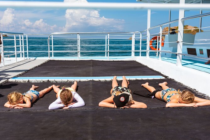 Flamingo Family Fun Catamaran Snorkel:Comfortable shaded seating - The return ride and Playa Flamingo sunset