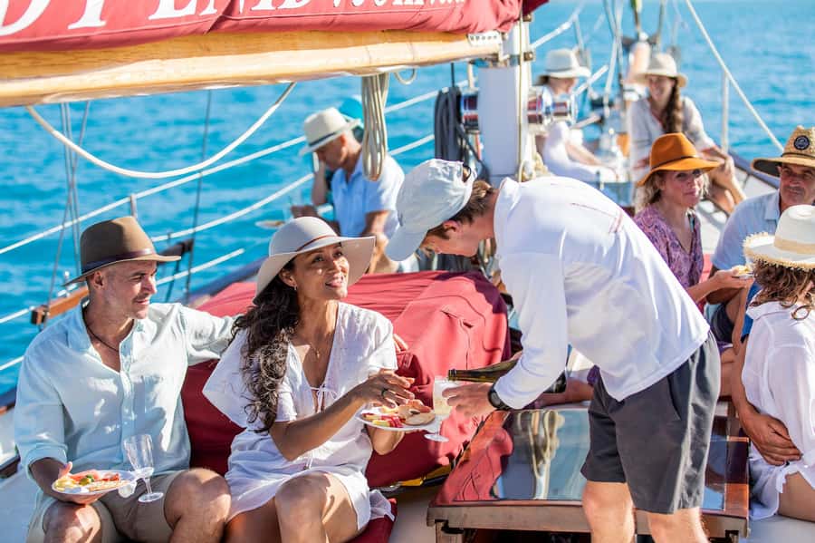 From Airlie Beach: Hook Island Cultural Tour, Sail & Snorkel - The sail back with sparkling wine and cheese