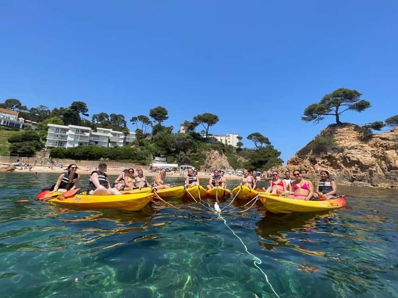 From Barcelona: Costa Brava Kayak & Snorkel Tour with Picnic - Getting fitted out at Platja d’Aro