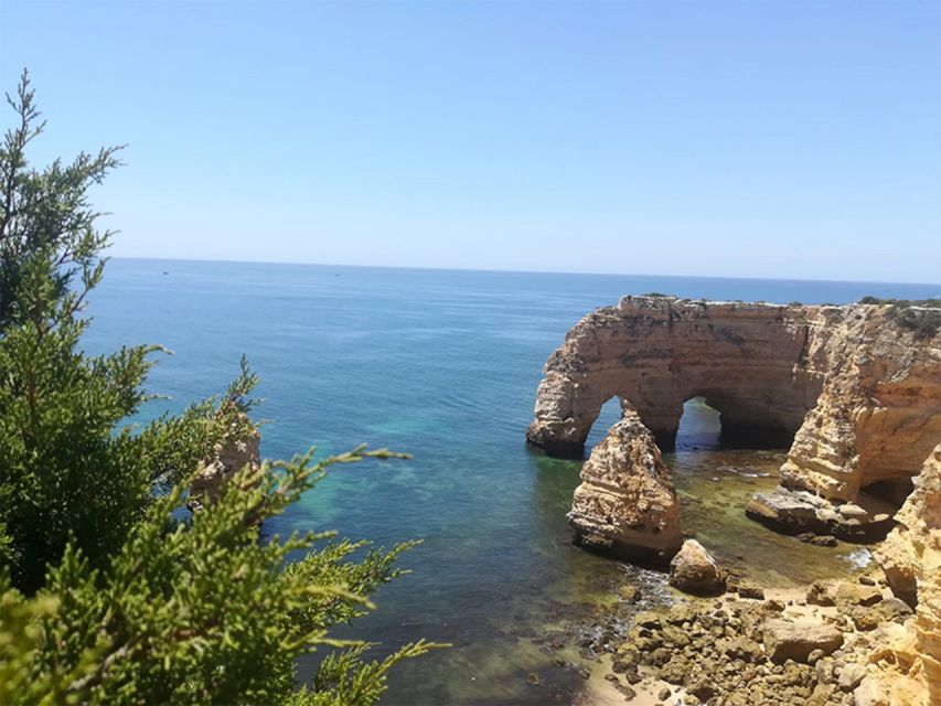 From Faro: 7 Valleys Hiking, Benagil Cave, & Snorkeling Tour - Marinha Beach and its heart-shaped arch