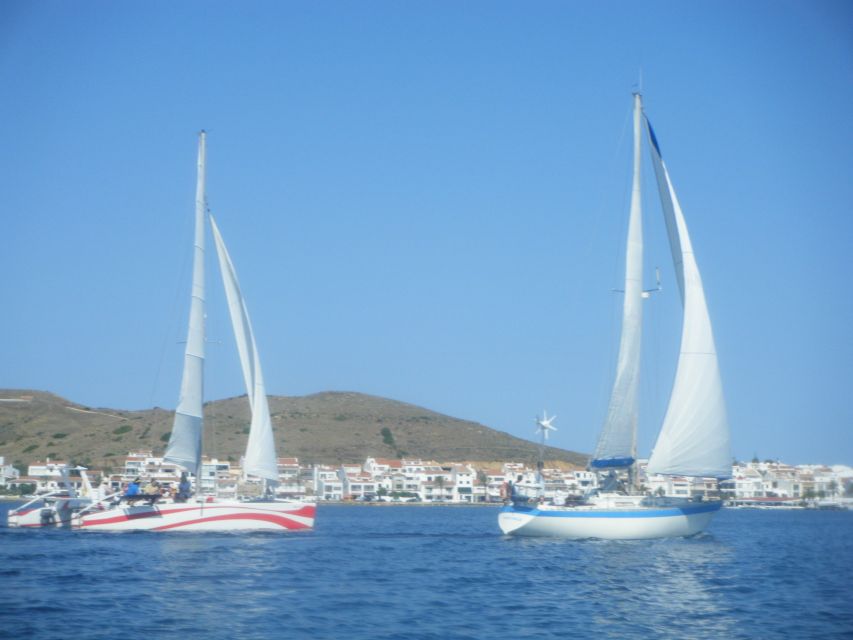 From Fornells: Half-Day Menorca Catamaran Trip w/ Snorkeling - Drinks, snacks, and the value of $88