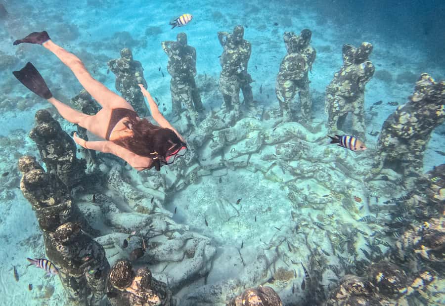 From Gili Air: Snorkeling with Turtles & Underwater Statue - The Nest brings underwater art and a crowd