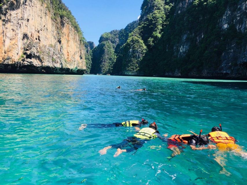 From Phi Phi: Half-Day Longtail Boat Tour with Snorkeling - Guides, language, and the pace of the day
