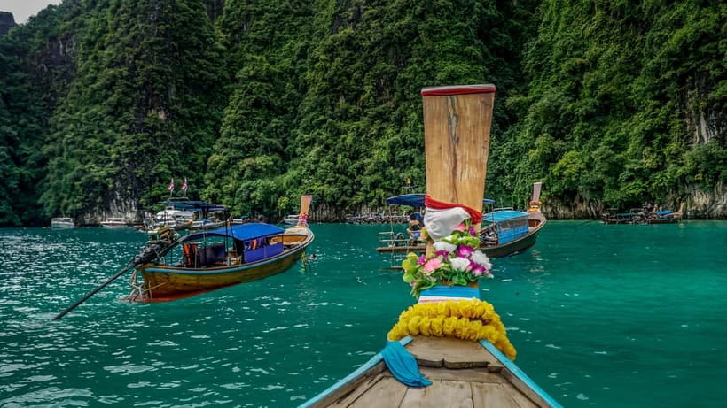 From Phi Phi: Maya Bay HalfDay Longtail Boat with Snorkeling - Viking Cave and the drawings on its limestone walls