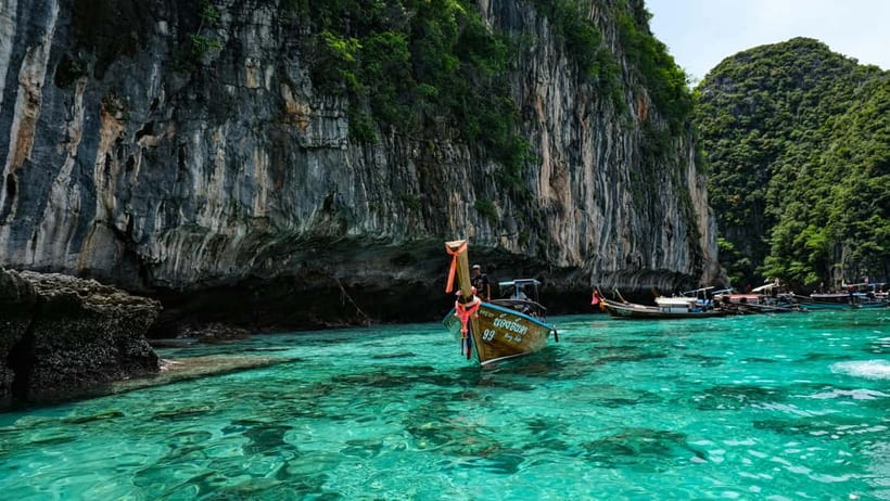 From Phi Phi: Maya Bay HalfDay Longtail Boat with Snorkeling - The 2:00 PM departure adds sunset and glowing plankton