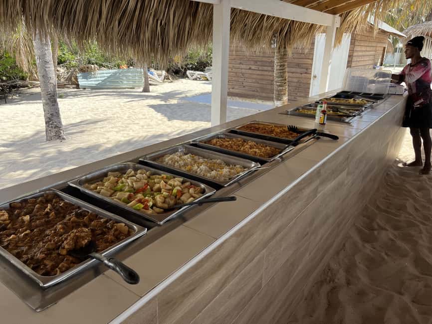 From Punta Cana: Small Group Catalina Island Snorkeling Tour - Catalina beach: lunch, swimming, and a busy middle of the day
