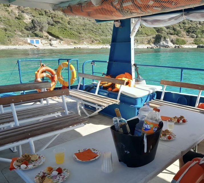 From Tropea: Capo Vaticano boat tour with snorkel & aperitif - The boat party: music, drinks, and snacks
