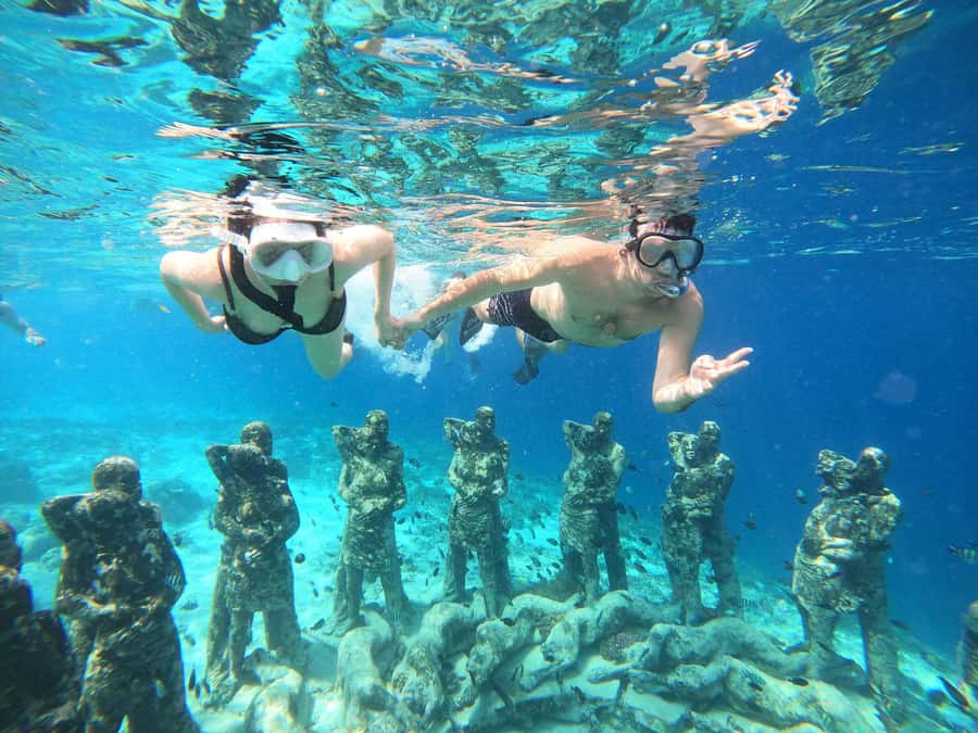 Gili Trawangan: Gili Islands Sunset Boat Tour and Snorkeling - Sunset on the water near Gili Trawangan