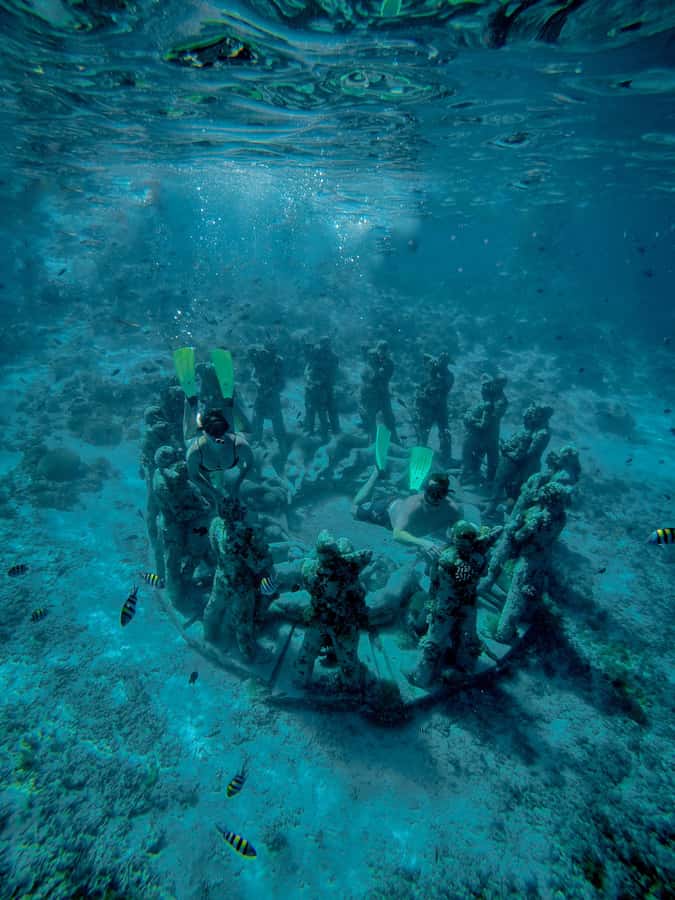 Gili Trawangan : Half Day Snorkeling with Turtle and Statue - Setting out on the glass-bottom boat