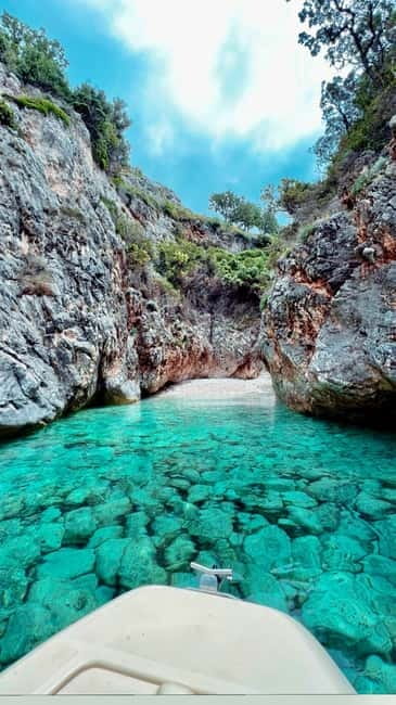 Grama Bay & Blue Cave: Snorkeling & Secret Beaches in Vlore - Dafina Bay and the Blue Cave show off the water