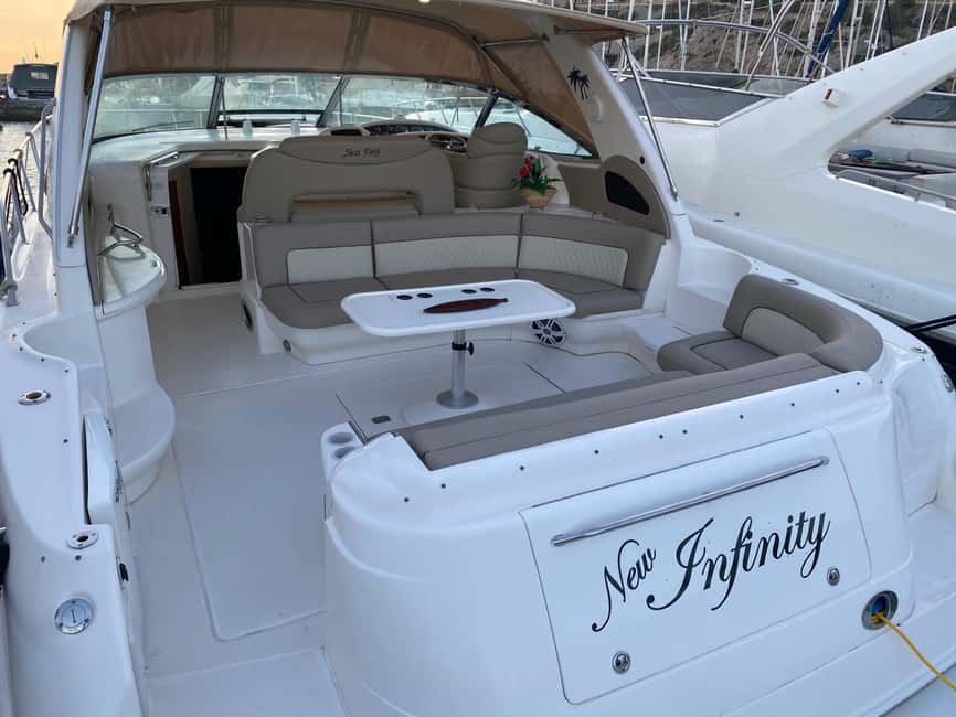 Gran Canaria: Shared yacht trip with drinks, lunch, and snorkeling - Perchel Cove and the Mogán coast from the water