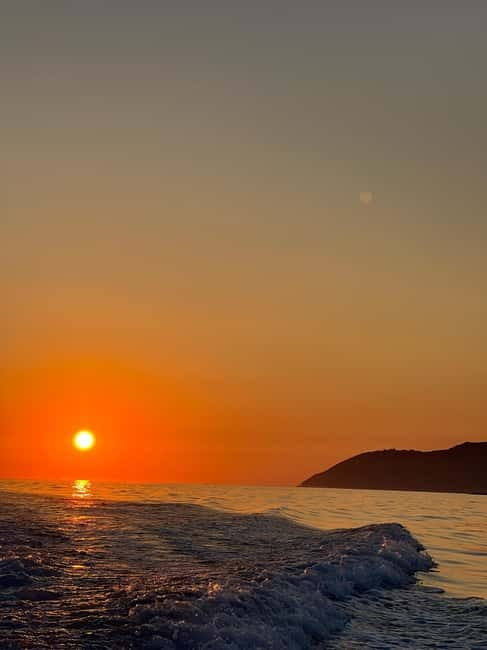 Himara: Sunset Cruise with Swim Stops and Snorkeling - Leaving Himara Mini Dock in the late afternoon