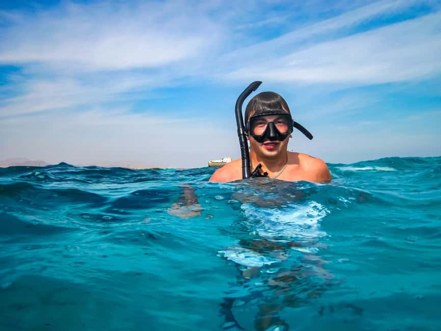 Hurghada: Dolphin & Coral Reef Snorkeling Tour with Lunch - The crew and snorkeling support