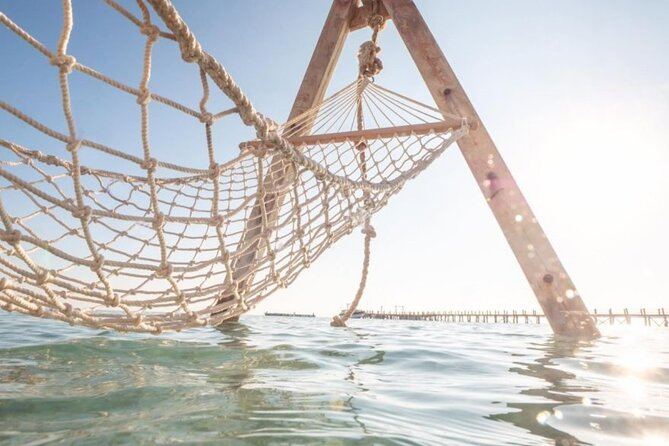 Hurghada: Orange Bay, Snorkeling, Watersports, Lunch & Drinks - Reaching Giftun Island by boat