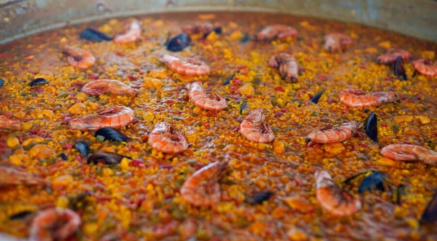Ibiza: Formentera Trip with Paddle, Snorkel and Lunch - Paella Lunch Served Between the Stops