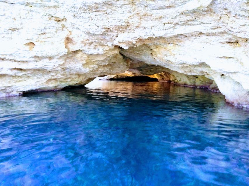 Ibiza: Sea Caves & Coves Snorkeling Paddle Boarding Tour - Drinks, fruit, and the Amazonia boat