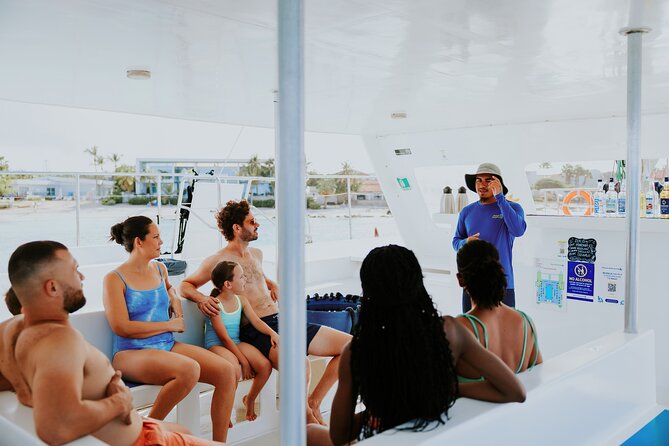 Iconic Aruba Sail and Snorkel Experience - A roomy catamaran with shade, music, and island views