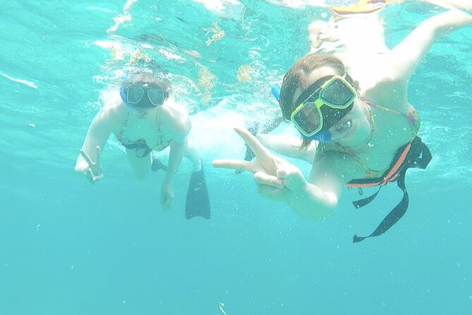 Isla Mujeres Catamaran Tour from Cancun with Snorkel and Open Bar - Isla Mujeres in a Short 1.5-Hour Window