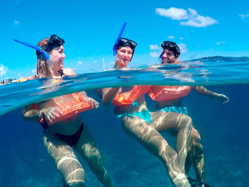 Isla Mujeres Catamaran Tour: Snorkel & Beach Adventure - A sunny day built around the sea