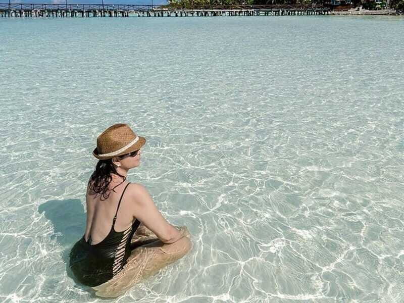 Isla Mujeres Catamaran Tour: Snorkel & Beach Adventure - The spinnaker flight and tequila finale