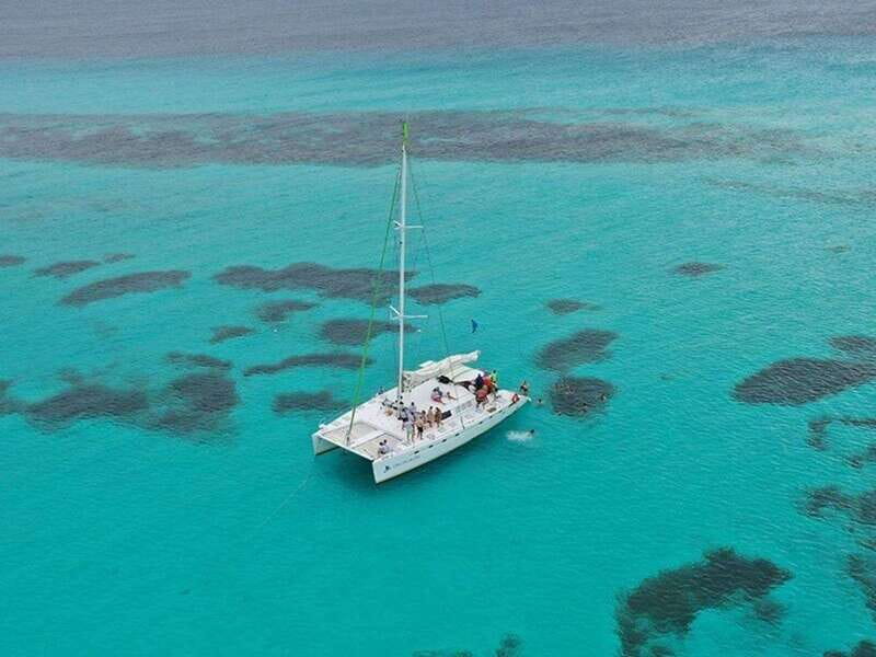 Isla Mujeres Catamaran Tour: Snorkel & Beach Adventure - Boarding the 40-foot catamaran