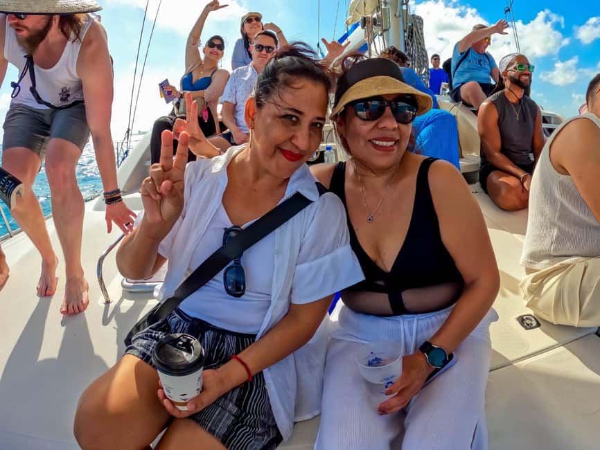 Isla Mujeres Catamaran Tour with Snorkeling & Open bar - Weather can make or break the day