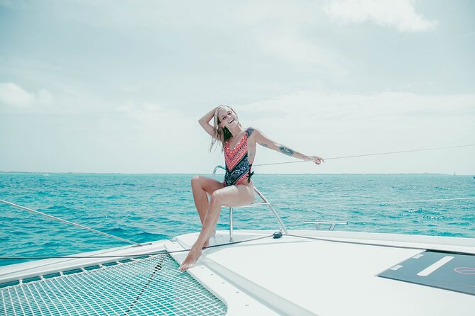 Isla Mujeres Cruise with Beach Club, Snorkel, Lunch and Open Bar - The catamaran ride and open bar