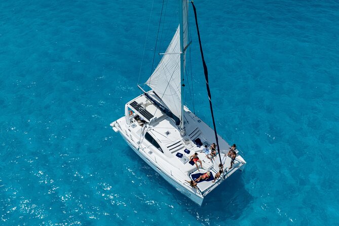 Isla Mujeres Day Tour with Catamaran, Snorkeling & Beach Club - Snorkeling in open water