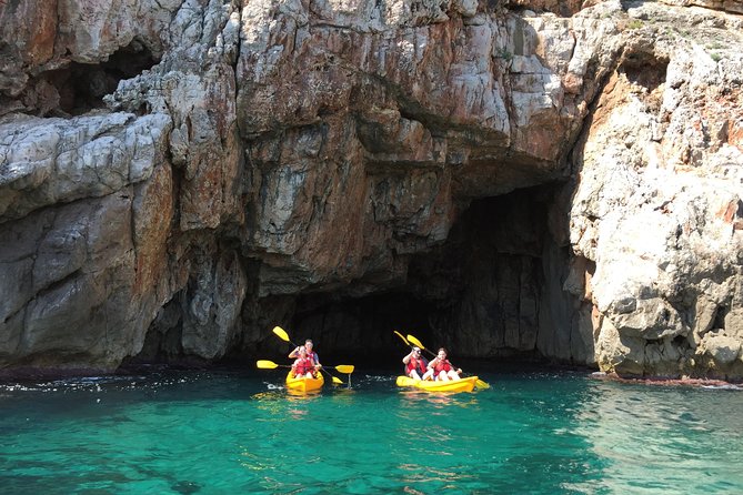 Kayak and snorkel excursion to Cova Tallada - Inside Cova Tallada with a lantern