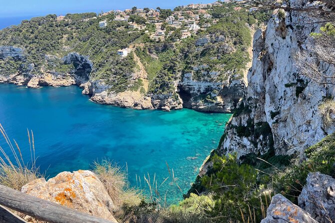 Kayak Paradise: Cala Portixol Snorkel, Cave & Cliff Jumping Tour - Cap Negre, a dramatic view from the kayak