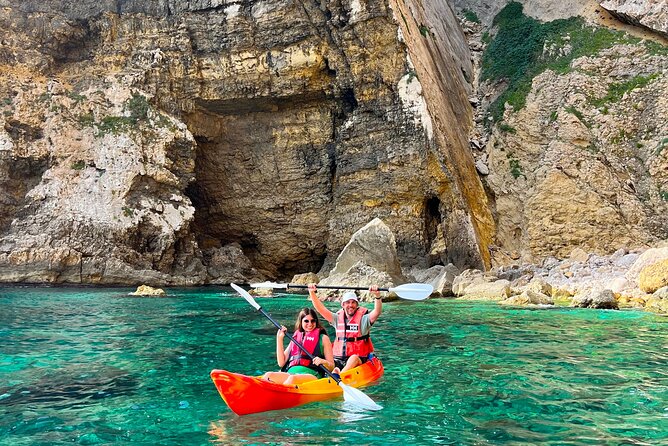 Kayak Paradise: Cala Portixol Snorkel, Cave & Cliff Jumping Tour - Isla de Portixol and the natural cave