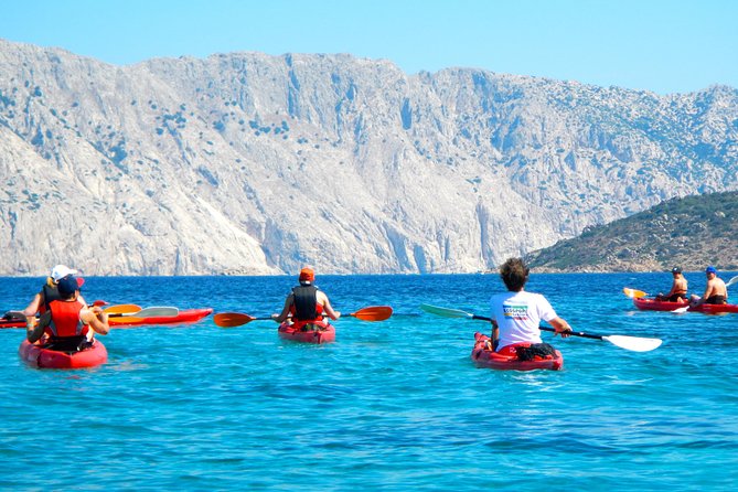 Kayak Tour with Snorkeling and Local Aperitif - Exploring rock formations, caves, and narrow passages