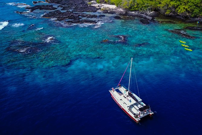 Kealakekua Bay (Captain Cook Monument) Snorkel and Sail Adventure - Breakfast with Kona coffee and a coastal view