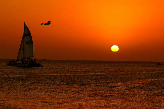 Key West Rum and Reggae: Reef Snorkel Adventure and Sunset Sail - From Front Street to the open water