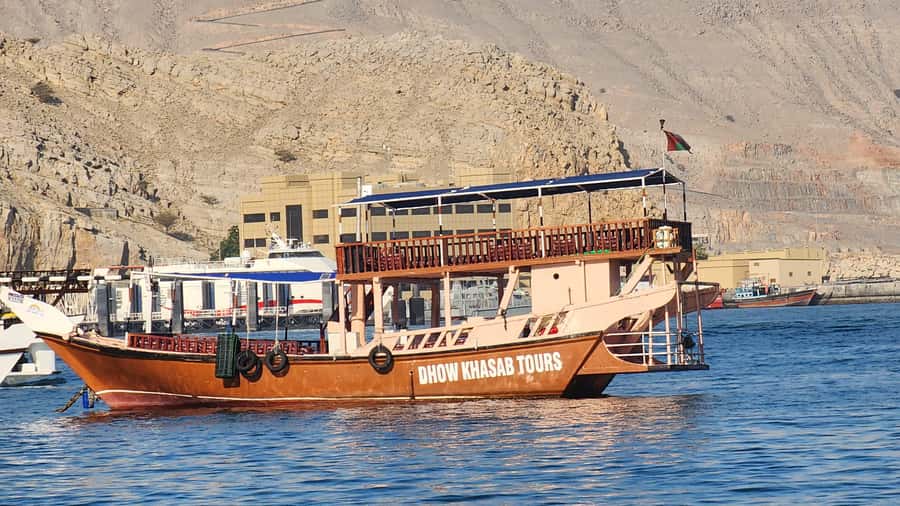 Khasab: Half-Day Dhow Cruise, Dolphin Watching, & Snorkeling - Setting out from Khasab by traditional dhow