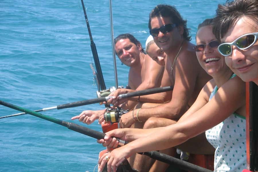 Koh Samui: Mr.Ung's Private Fishing/Boat Trip/Snorkeling/BBQ - Leaving Koh Samui on a covered wooden boat
